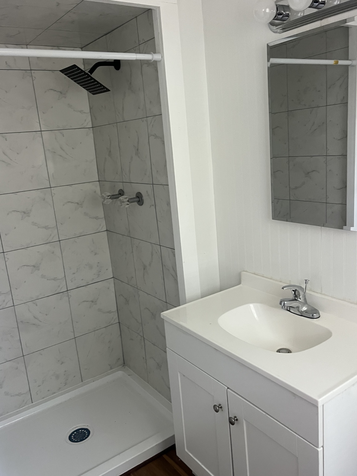 Bathroom with tiled shower